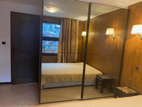 Appartement chaleureux, 1 chambre, centre Les Gets, proche pistes et commodités, balcon ensoleillé