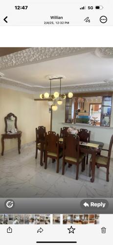 a living room with a dining room table and chairs at The Garcias Village C with Jacuzzi ACNetflix in La Alianza