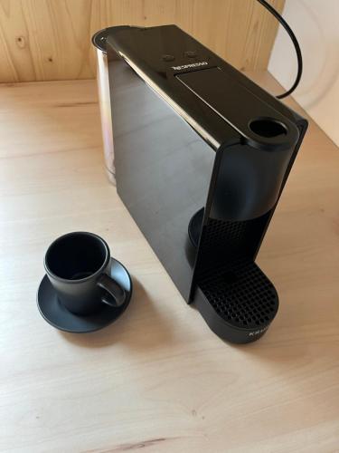 Sáňky Apartmányにあるコーヒーまたはお茶