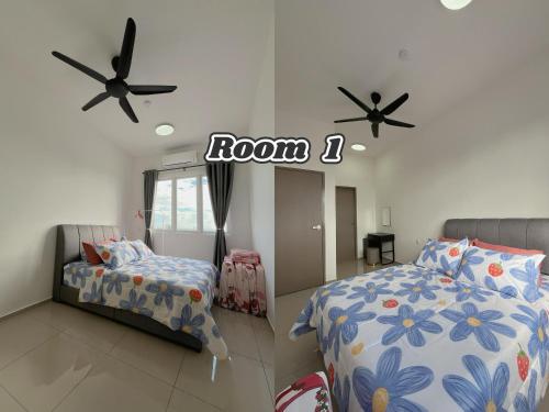 a bedroom with two beds and two ceiling fans at 198 Guesthouse D'Aman Residence in Alor Setar