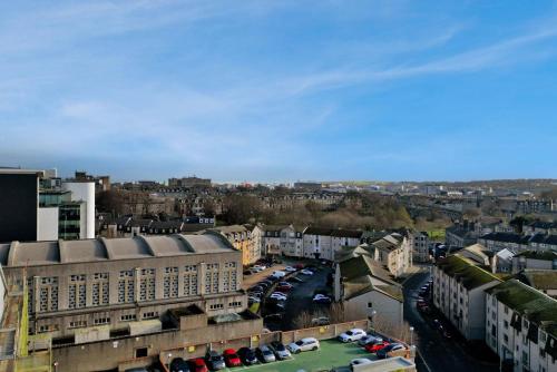 an aerial view of a city with buildings and cars at Ash Residence City Centre in Aberdeen