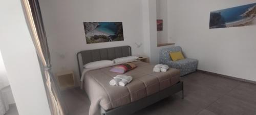 Een bed of bedden in een kamer bij Alta Quota RELAX on the SEA