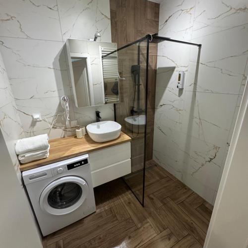 Koupelna v ubytování Kwiatkowskiego Apartments River Side City View