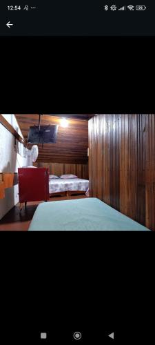 Ένα ή περισσότερα κρεβάτια σε δωμάτιο στο Hostel Raizer