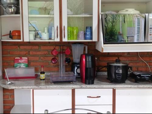 Η κουζίνα ή μικρή κουζίνα στο Hostel Raizer