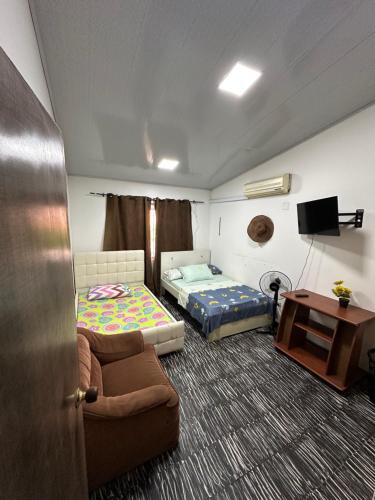 Una cama o camas en una habitación de Casa refugio antojitos