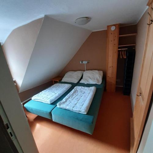 Postel nebo postele na pokoji v ubytování Ferienhaus Inge