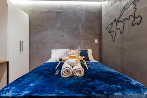 Ένα ή περισσότερα κρεβάτια σε δωμάτιο στο DOMUS GARDEN - Hostel e Studios