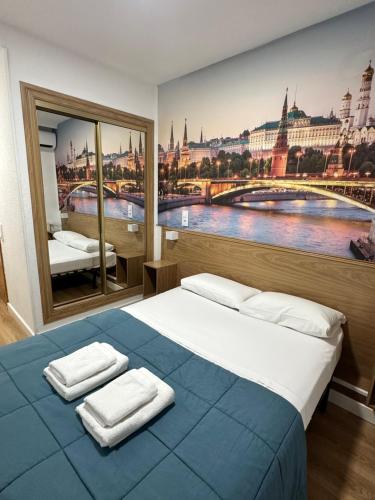 Postel nebo postele na pokoji v ubytování Hostal Zaragoza Centro