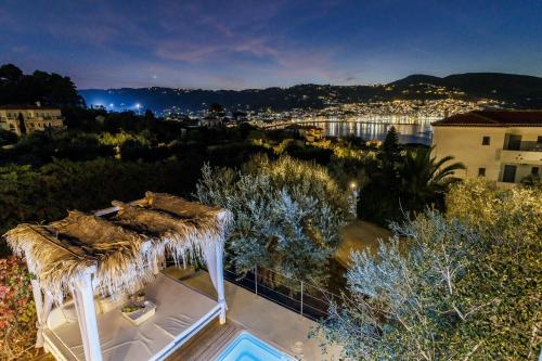 a view of a house with a roof at Evlalia Studios & Villas in Skopelos Town