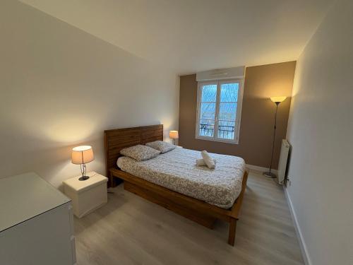 Postel nebo postele na pokoji v ubytování T5 Disney Paris/Val d’Europe