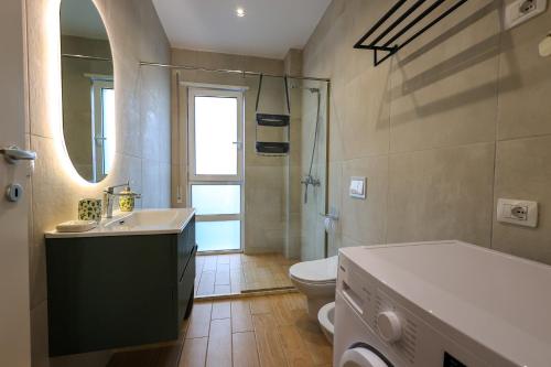 Salle de bains dans l'établissement SanPietro Vacation Rentals