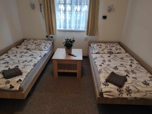 Postel nebo postele na pokoji v ubytování Apartmán Dobrá mysl
