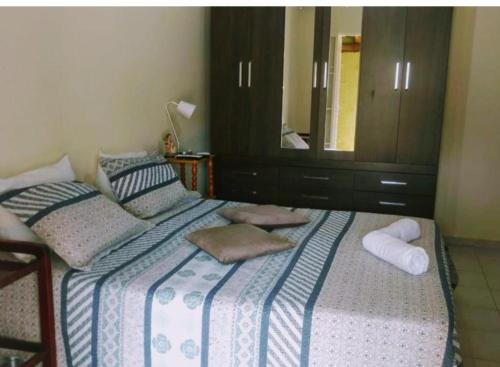 Postel nebo postele na pokoji v ubytování Suíte casa