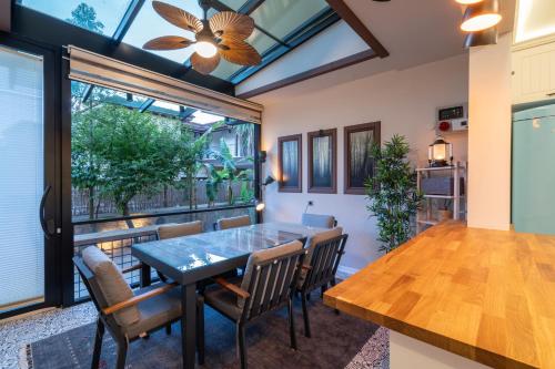 a dining room with a table and chairs at Cozy Home in Oldtown Kaleici in Antalya
