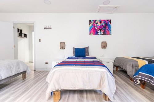 Un ou plusieurs lits dans un hébergement de l'établissement hostal mancora