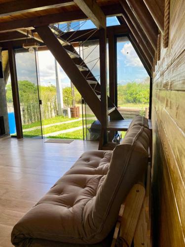 Posezení v ubytování Nova cabana com jacuzzi perto do mar
