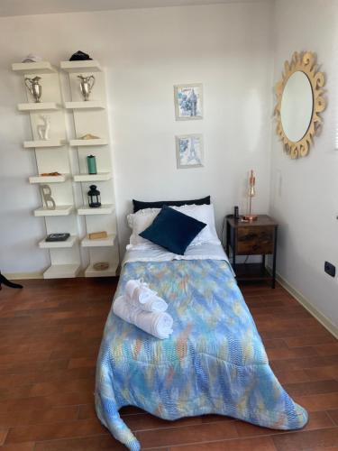 Postel nebo postele na pokoji v ubytování B&B Resort Palazzo Pirozzi