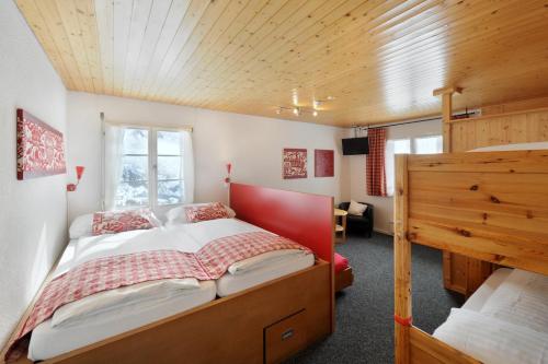 Postel nebo postele na pokoji v ubytování Alpinhotel Bort