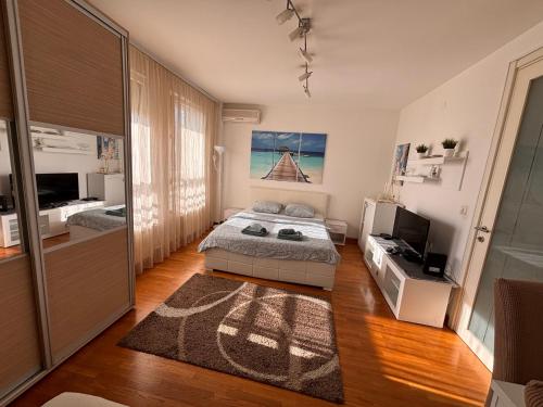 Postel nebo postele na pokoji v ubytování Belvil Belgrade