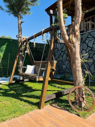 Κήπος έξω από το Lilyum garden house&organization