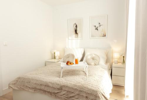 Ένα ή περισσότερα κρεβάτια σε δωμάτιο στο Luxus Apartament Joanna