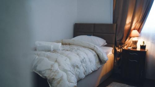 Ένα ή περισσότερα κρεβάτια σε δωμάτιο στο Hotel Damar