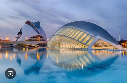 a view of the sydney opera house at night at Mestalla flats & Rut in Valencia