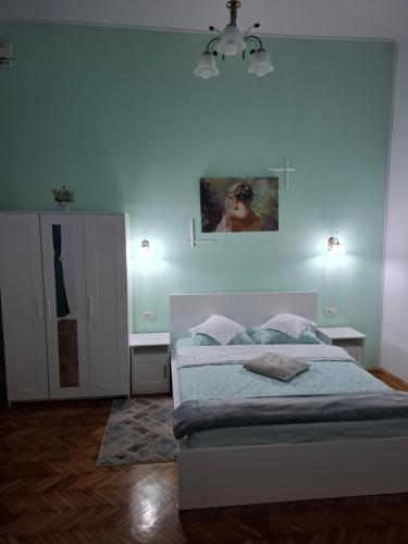 Ένα ή περισσότερα κρεβάτια σε δωμάτιο στο Yasmine Apartment Ultracentral