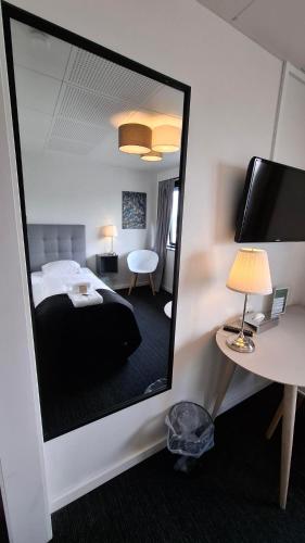 Postel nebo postele na pokoji v ubytování Hotel Runavík