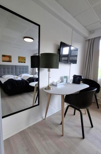 Postel nebo postele na pokoji v ubytování Hotel Runavík