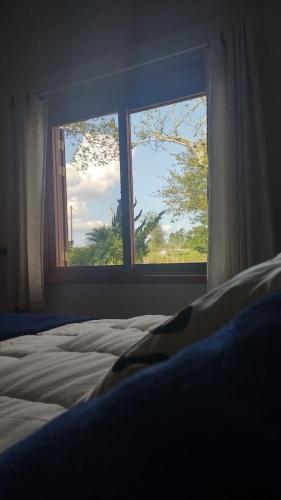 Ένα ή περισσότερα κρεβάτια σε δωμάτιο στο Jardins da Gastehuas
