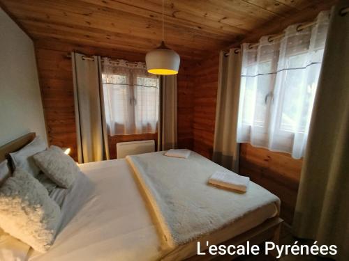 Posteľ alebo postele v izbe v ubytovaní Vue imprenable et jacuzzi 4 Etoiles