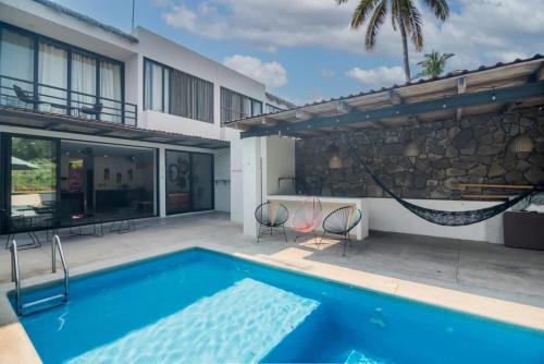 Kolam renang di atau dekat dengan Celina beach house en Manzanillo