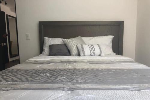 Postel nebo postele na pokoji v ubytování Departamento a 5 mins de Polanco