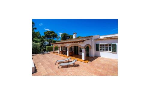 an image of a house with a patio at Es Calo De N'aladern in Capdepera