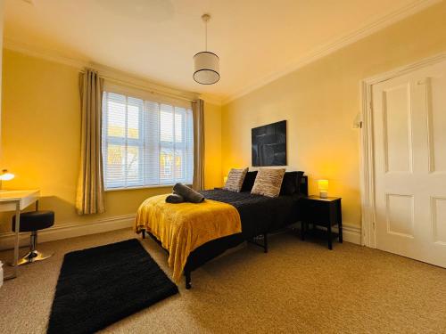 Ένα ή περισσότερα κρεβάτια σε δωμάτιο στο Park Apartment 2, Close to Tynemouth