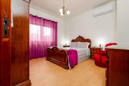 Ένα ή περισσότερα κρεβάτια σε δωμάτιο στο Casa O Limoeiro
