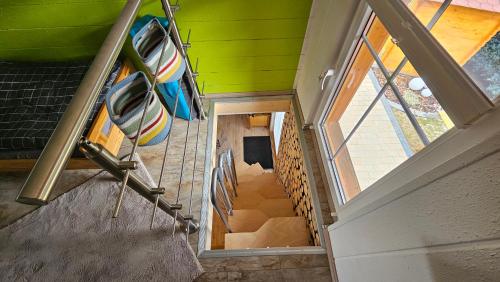 an overhead view of a staircase in a house at Sagritzer Alpenhäusl in Großkirchheim