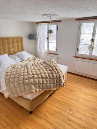 Una cama o camas en una habitación de B&B Bad Tiefenau, HAUS AN DER QUELLE