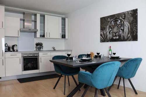 Kuchyň nebo kuchyňský kout v ubytování Dream&Stay - City Apartment Papenburg