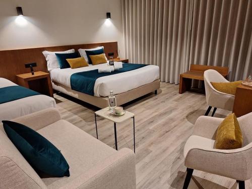 Postel nebo postele na pokoji v ubytování 3M Hostel & Suites