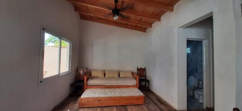 Postel nebo postele na pokoji v ubytování Quincho Lo de Fausto