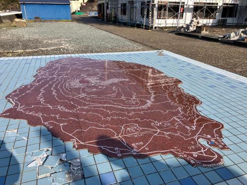 a map of theilippines on a tiled floor at Stay Do in Oshima