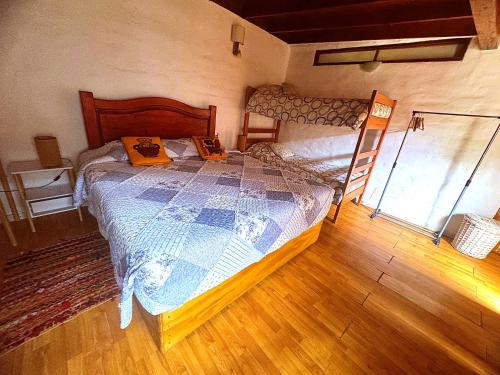a bedroom with a large bed in a room at Atacama Lodge Rukazen Rústico in San Pedro de Atacama