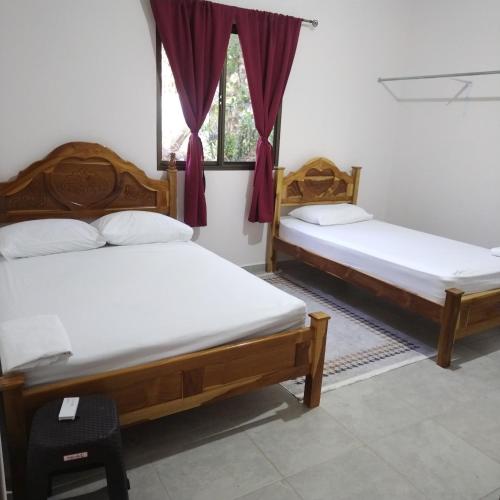 Postel nebo postele na pokoji v ubytování Lis Home