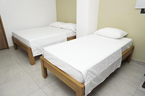 Cama o camas de una habitación en Hotel INdustrial