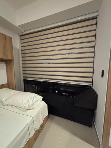 Llit o llits en una habitació de Parque 93 Chicó