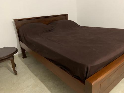 Giường trong phòng chung tại Tranquil Grove