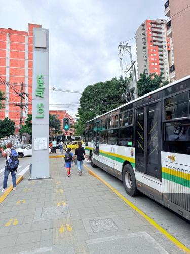 a bus parked on the side of a street at Apto 203 - Casa bendita in Medellín